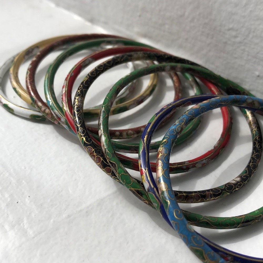 Set of nine intricate Asian bangles